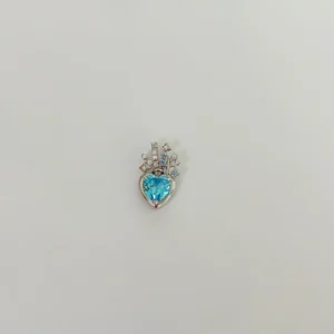 Sky blue 5A cubic zirconia heart pendant in rhodium-plated sterling silver with halo accent stones, RSL compliant jewelry